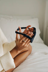 eye mask sleep in a woman's hand